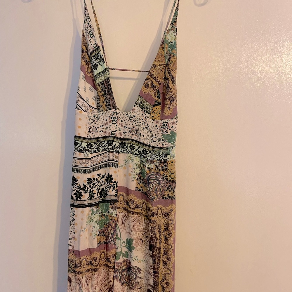 Free people jumpsuit. Has a side zipper and is xxs/size 0